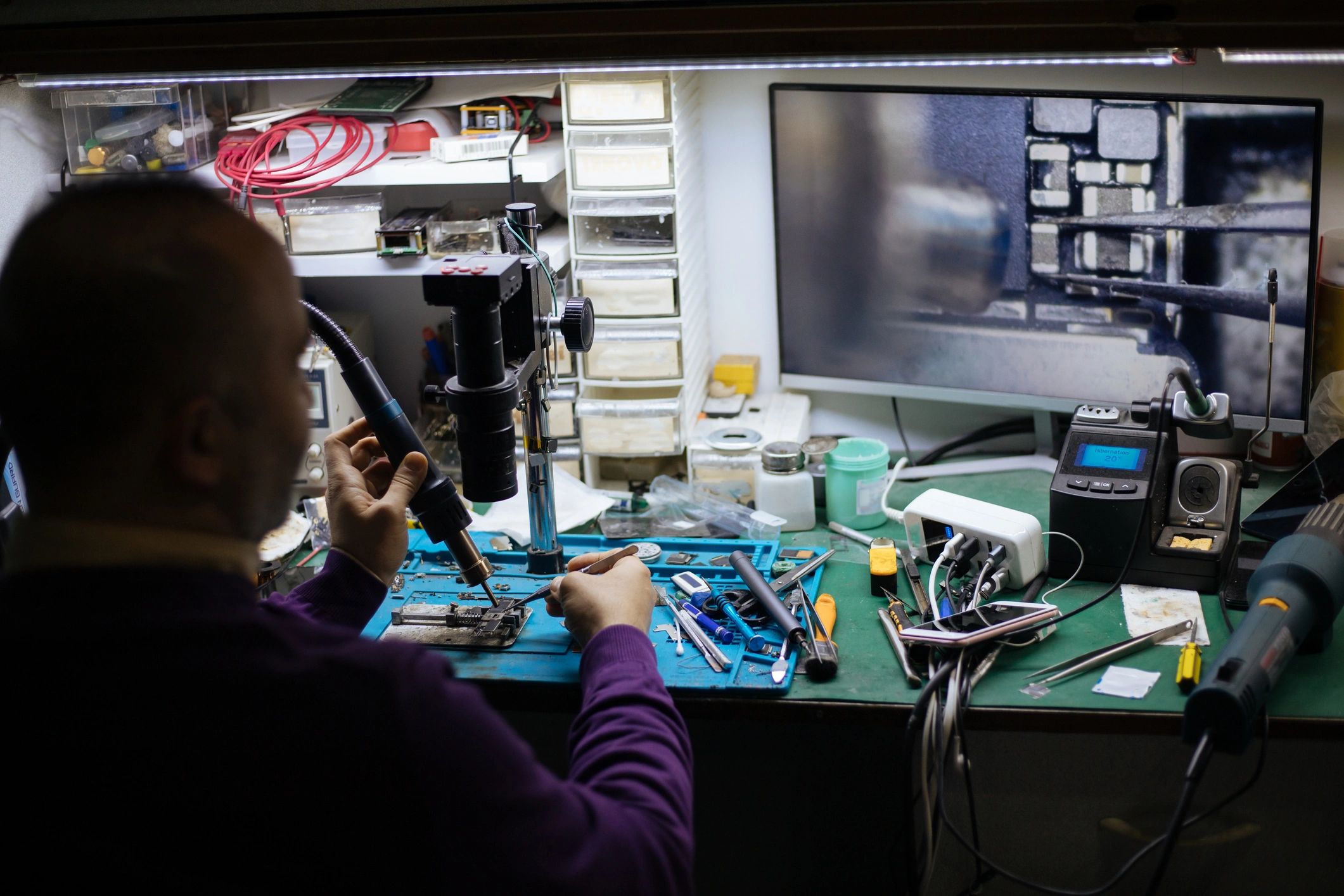 Technician repairing a desktop PC