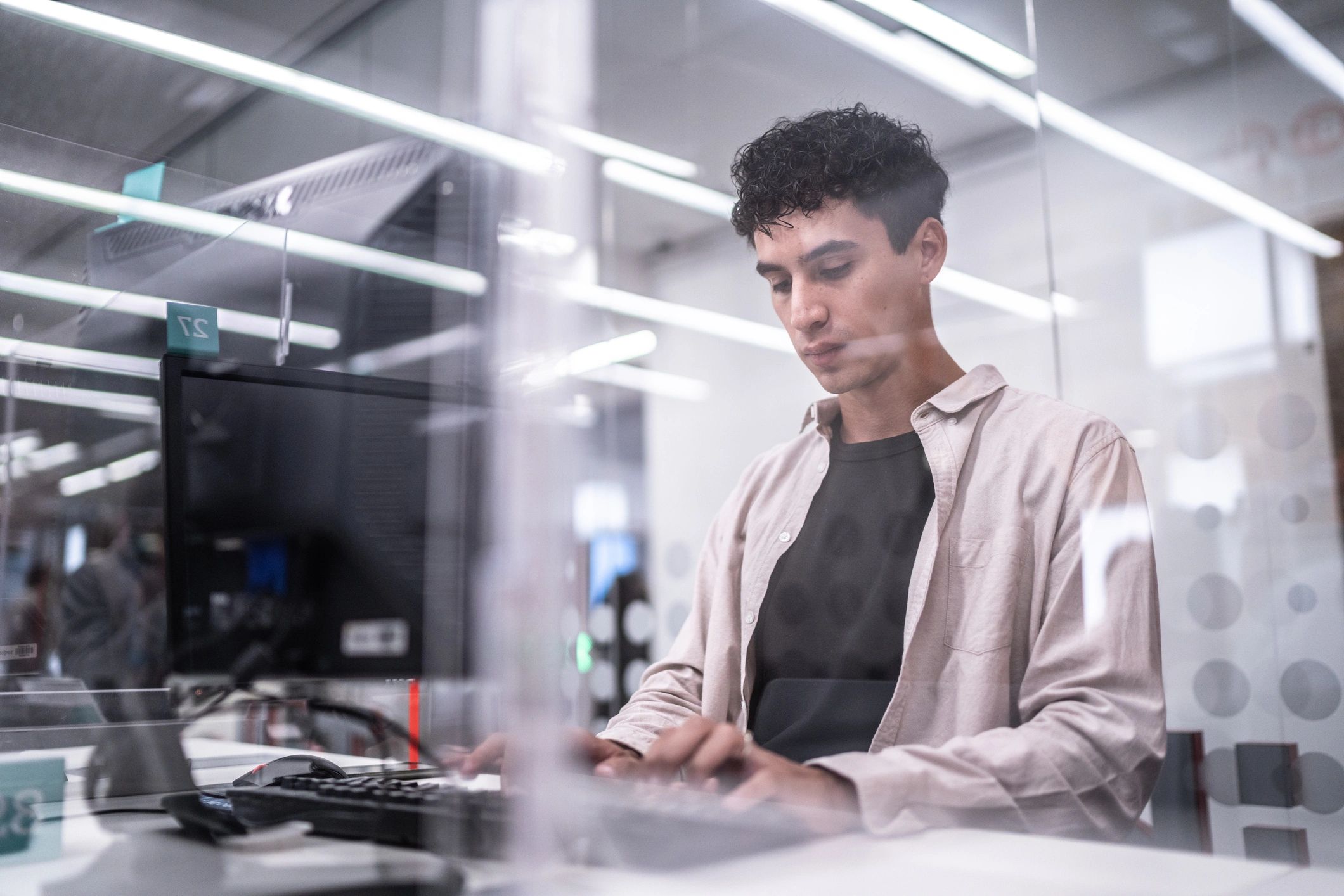 Technician working on a desktop PC during a repair