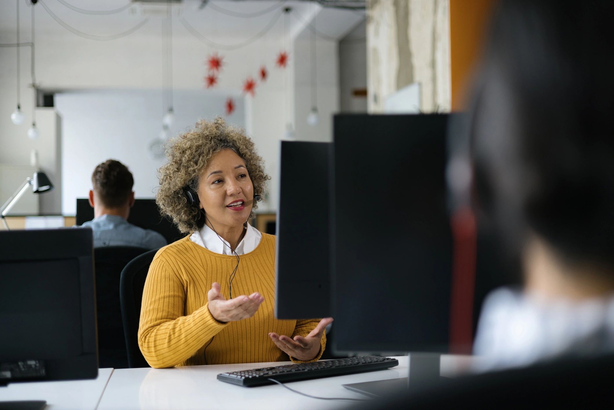 IT support professional at a workstation